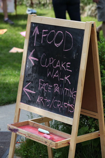 sign describing the food and arts table at the truck touch, aDC area family event