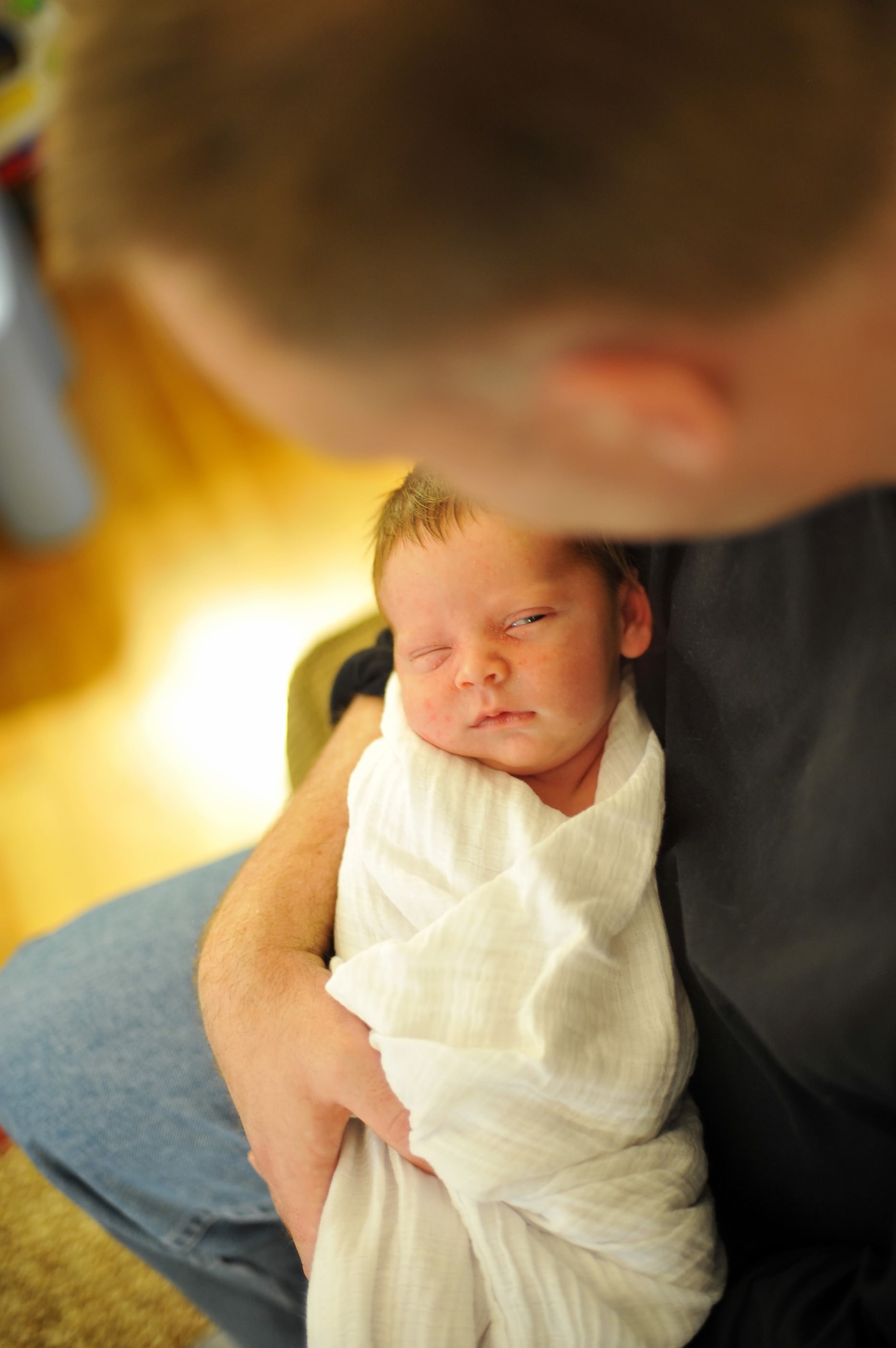 A skeptical newborn baby boy wonder why his mom had placenta encapsulation in silver spring MD